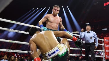 LAS VEGAS, NEVADA - MAY 04: Canelo Alvarez knocks down Jaime Munguia in their super middleweight championship title fight at T-Mobile Arena on May 04, 2024 in Las Vegas, Nevada.    Christian Petersen / Getty Images / AFP (Photo by Christian Petersen  /  GETTY IMAGES NORTH AMERICA  /  Getty Images via AFP)