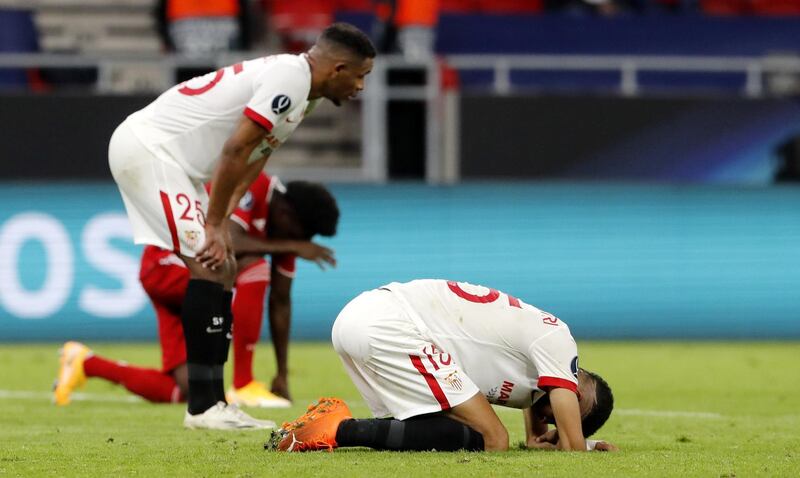 Youssef En-Nesyri, foreground, of Sevilla after the defeat in Budapest. EPA