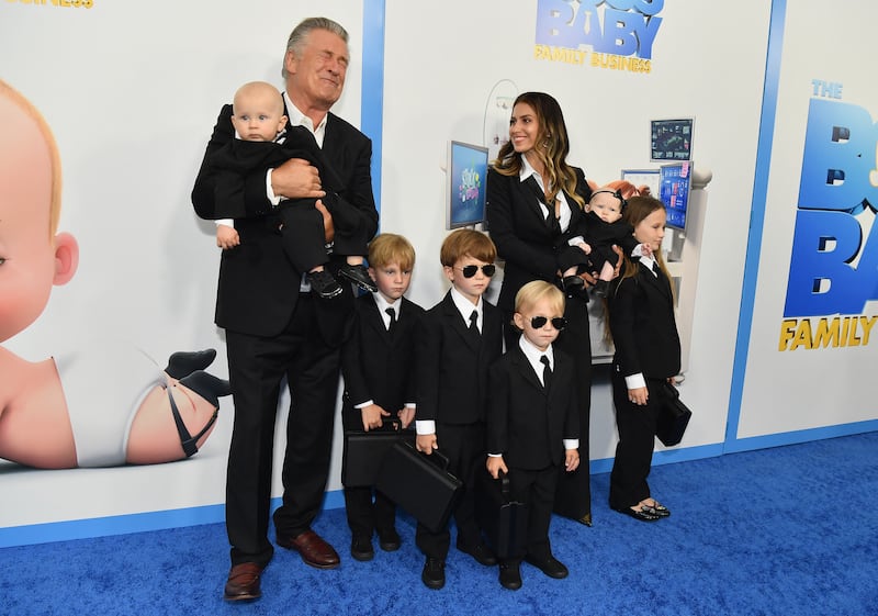 Alec and Hilaria Baldwin with their six children. AFP
