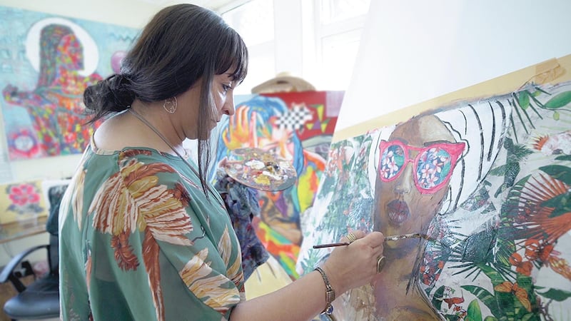 Artist Samar Kamel in her studio. Kamel is one of 19 artists taking part in the Art Gap exhibition at World Art Dubai, Dubai World Trade Centre. Courtesy Standard Chartered