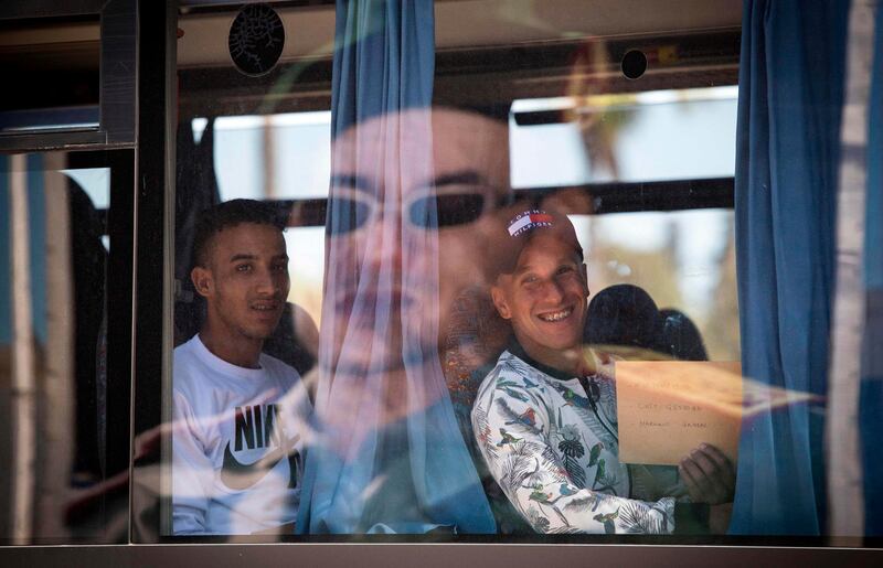 Moroccan youths take part in a recruitment process for military service at an air force base in the city of Kenitra, Morocco begins selecting recruits, the first batch since the resumption to compulsory military service.  AFP