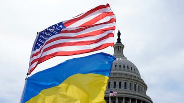 The American and Ukrainian flags wave outside the Capitol in Washington. AP