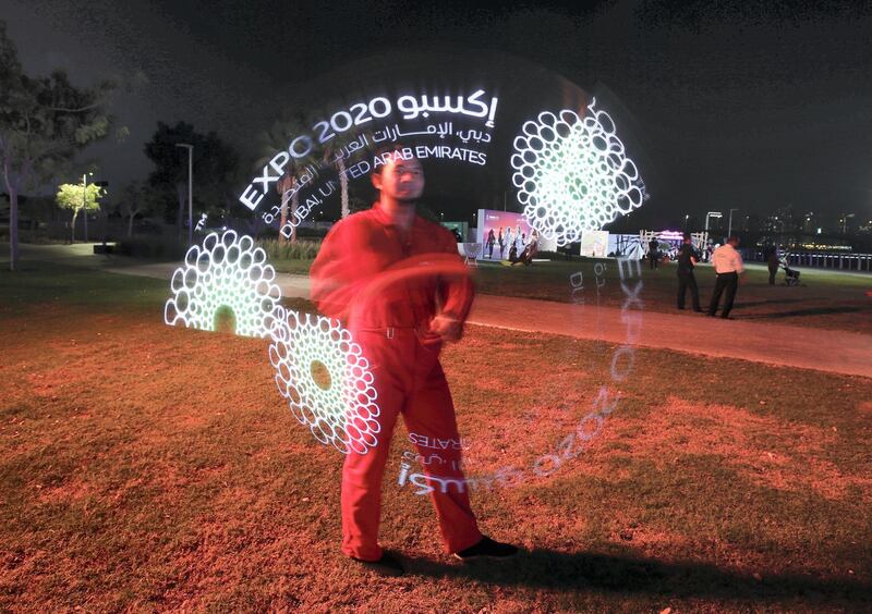 Abu Dhabi, United Arab Emirates- A performer entertaining visitors at the Expo 2020 countdown at The Louvre, Saadiyat.  Leslie Pableo for The National