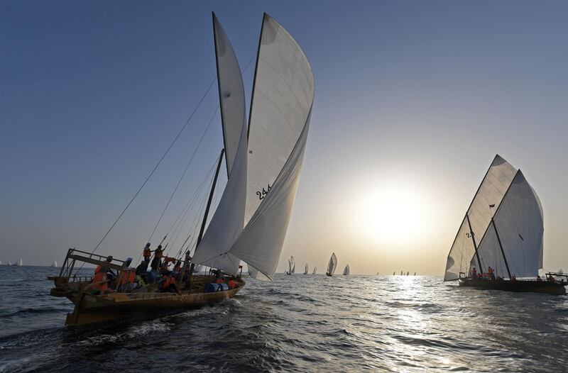 Sailors participate in the annual long-distance dhow sailing race, known as Al Gaffal, near Sir Abu Nair island towards Dubai.  AFP