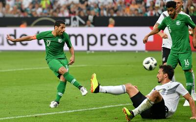 epaselect epa06794882 Saudi Arabia's Taiseer Aljassam (L) scoring his team first goal during the international friendly soccer match between Germany and Saudi Arabia in Leverkusen, Germany, 08 June 2018.  EPA/SASCHA STEINBACH