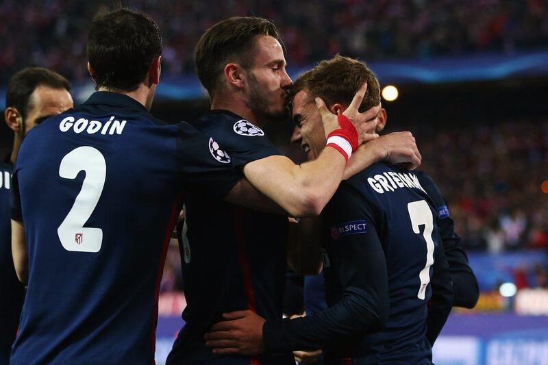 Antoine Griezmann of Atletico Madrid celebrates scoring against Barcelona on Wednesday night as they advanced to the Champions League semi-finals. Alex Grimm / Bongarts / Getty Images / April 13, 2016 