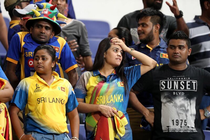 ABU DHABI , UNITED ARAB EMIRATES, September 17 , 2018 :-  Dejected supporter of Sri Lanka after Afghanistan beat Sri Lanka by 91 runs in  the Asia Cup UAE 2018 cricket match between Afghanistan vs Sri Lanka at Sheikh Zayed Cricket Stadium in Abu Dhabi. ( Pawan Singh / The National )  For News/ Sports /Instagram. Story by Amith