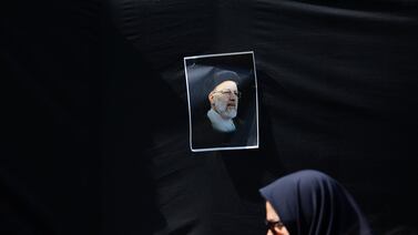 A picture of the late President Ebrahim Raisi is seen on a street in Tehran on Monday. The full impact of his sudden death, along with that of other senior Iranian political figures in a helicopter crash, will only be understood days or months from now. Reuters