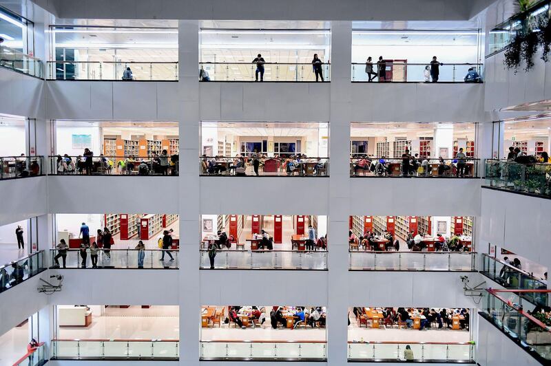 University students preparing for the upcoming National Entrance Examination for Postgraduate at a library of Shenyang Agricultural University in Shenyang in China's northeastern Liaoning province. AFP