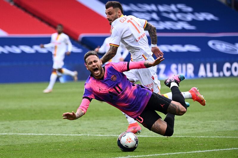 PSG's Neymar claims a foul after a challenge from Lens defender Jonathan Clauss. AFP