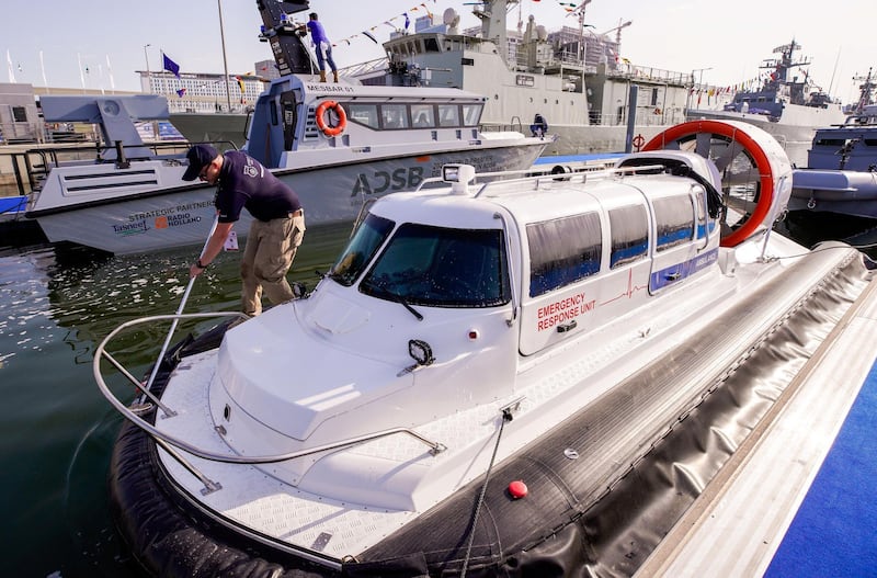 Abu Dhabi, United Arab Emirates, February 22, 2021.  Idex 2021 Day 2.
Marine vessel crews wash their boats before the start of the exhibition.
Victor Besa / The National
Section:  NA