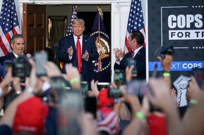 U.S. President Donald Trump delivers remarks to the City of New York Police Benevolent Association at Trump National Golf Club in Bedminster, New Jersey, U.S., August 14, 2020. REUTERS/Sarah Silbiger