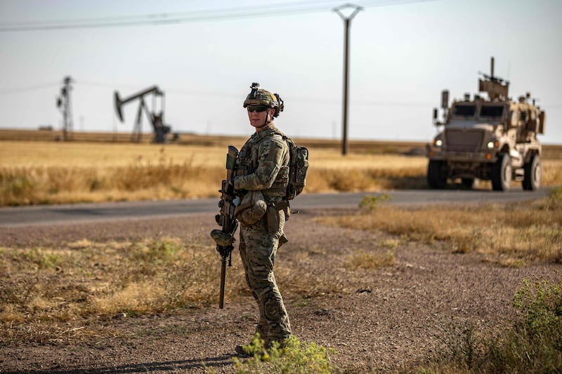 US troops patrol oil wells in Syria's north-eastern Hasakah province. AFP