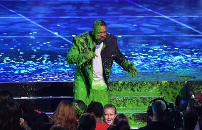 Actor/singer Will Smith gets slimed on stage during the 32nd Annual Nickelodeon Kids' Choice Awards at the USC Galen Center on March 23, 2019 in Los Angeles. / AFP / Valerie MACON
