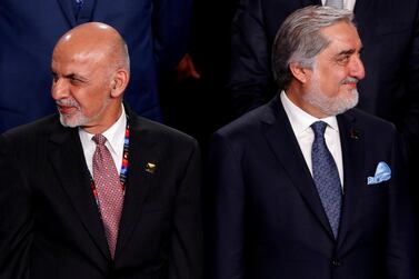 Afghanistan's President Ashraf Ghani, left, and arch political rival Abdullah Abdullah. Reuters