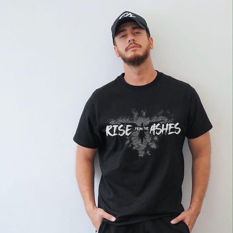 Moroccan singer Saad Lamjarred wearing Zuhair Murad's Rise from the Ashes T-shirt. Instagram / Zuhair Murad Official 