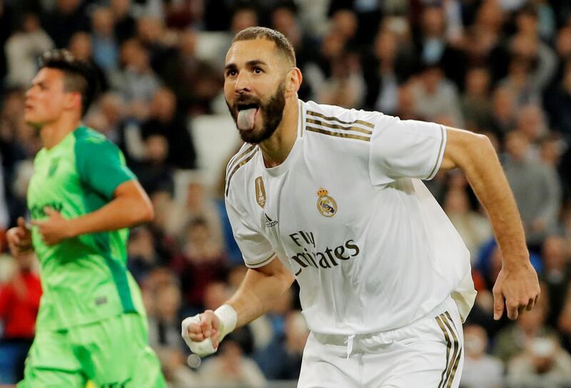 Real Madrid's Karim Benzema celebrates after scoring their fourth goal from the penalty spot. Reuters