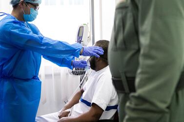 An inmate receives a Covid-19 test at Dubai Central Prison. Reem Mohammed / The National