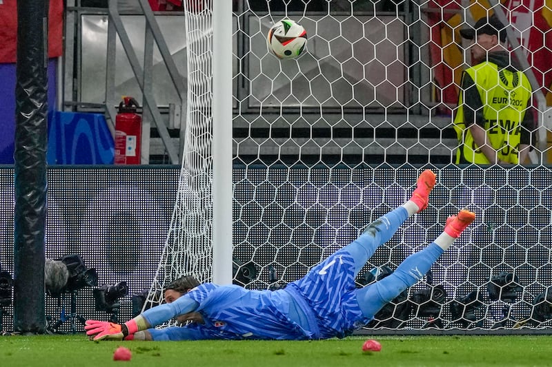 Switzerland's goalkeeper Yann Sommer fails to save Robert Andrich's shot before the goal was disallowed by VAR. AP 