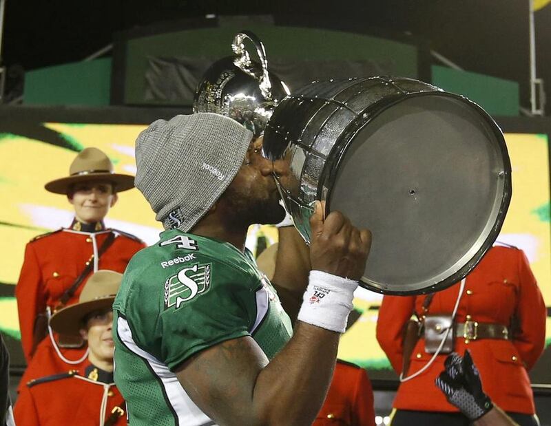 Saskatchewan Roughriders quarterback Darian Durant celebrates with the Grey Cup. Todd Korol / Reuters