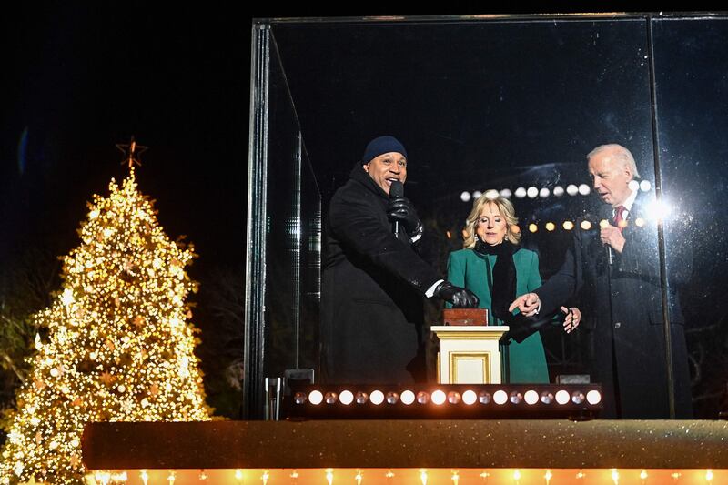 The Bidens and US rapper LL Cool J at the ceremony. AFP