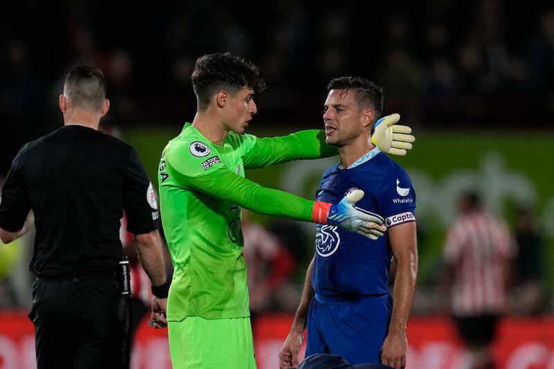 Chelsea goalkeeper Kepa Arrizabalaga speaks with teammate Cesar Azpilicueta. AP