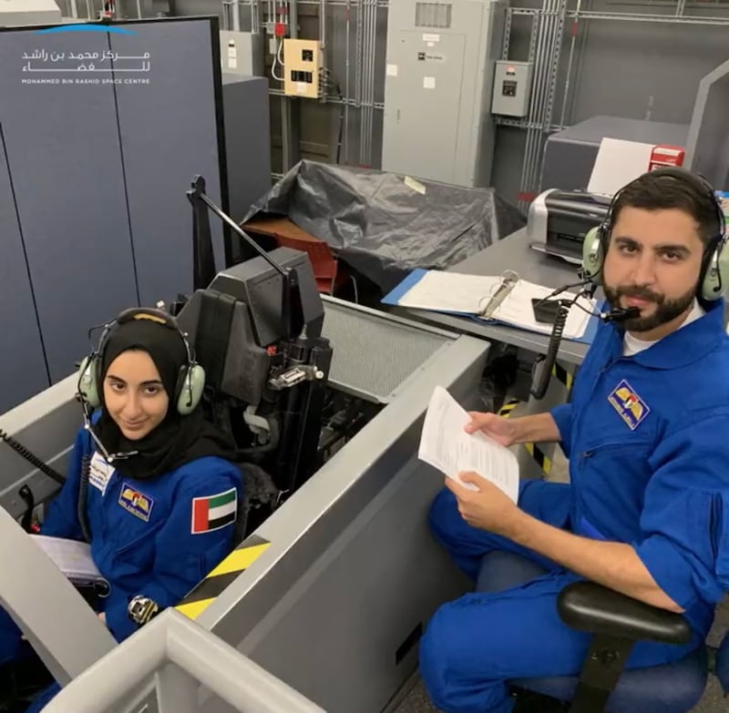 Ms Al Matrooshi and Mr Al Mulla learn how to fly through a simulator course in Florida. Photo: MBRSC