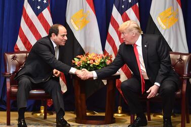 Egyptian President Abdel Fatah El Sisi and US President Donald Trump shake hands at a meeting in New York on September 24, 2018. AFP