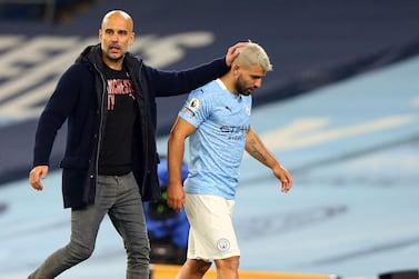 Manchester City striker Sergio Aguero is substituted by manager Pep Guardiola against Arsenal. AFP