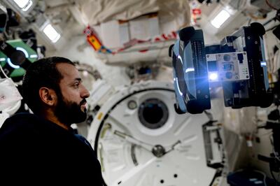 Sultan Al Neyadi, with a space robot that is assisting in daily tasks, scientific experiments and educational activities. @Astro_Alneyadi / Twitter