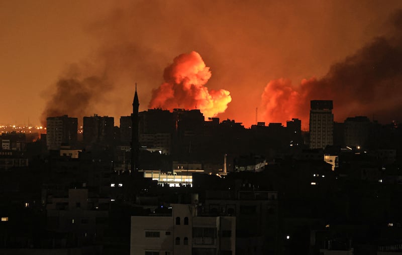 A ball of fire erupts in Gaza city after an Israeli air strike. AFP
