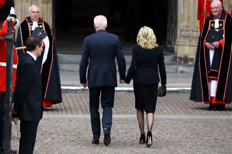 US President Joe Biden and first lady Jill Biden enter Westminster Abbey for the state funeral and burial of Queen Elizabeth. AFP