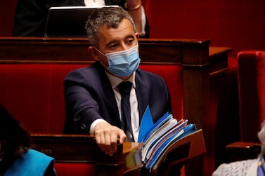 French Interior Minister Gerald Darmanin, wearing a protective face mask, said France will move to expel refugees who are found to be extremists. Reuters.