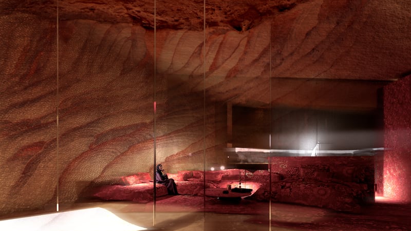The site’s dramatic rock faces are a central focus of the design, seen here in a guest room.Photo: Jean Nouvel