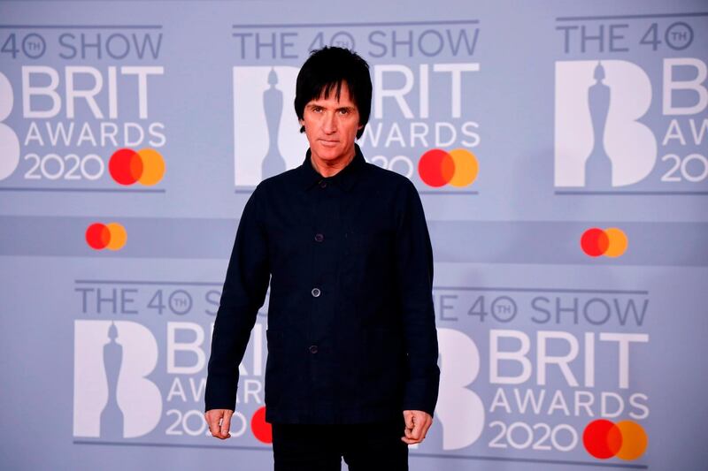 Johnny Marr arrives at the Brit Awards 2020 at The O2 Arena on Tuesday, February 18, 2020 in London, England. AFP