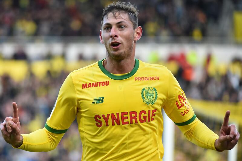 (FILES) In this file photo taken on November 04, 2018 Nantes' Argentinian forward Emiliano Sala celebrates after scoring a goal during the French L1 football match between Nantes (FC) and Guingamp (EAG), at the La Beaujoire stadium in Nantes, western France.
 Argentine footballer Emiliano Sala's body is to be returned to Argentina on Friday for his wake at the Club Atletico y Social San Martin in his hometown Progreso, Santa Fe province. Sala's body was recovered from plane wreckage in the English Channel last week. He was flying to his new team, English Premier League side Cardiff City, from his old French club Nantes when his plane went missing over the Channel on January 21. / AFP / JEAN-FRANCOIS MONIER             
