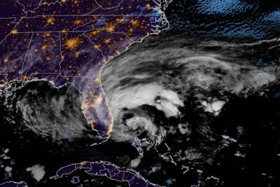 This RAMMB National Oceanic and Atmospheric Administration (NOAA) satellite handout image shows Hurricane Nicole on it's way to make landfall off the east coast of Florida. RAMMB/ NOAA / NESDIS / AFP