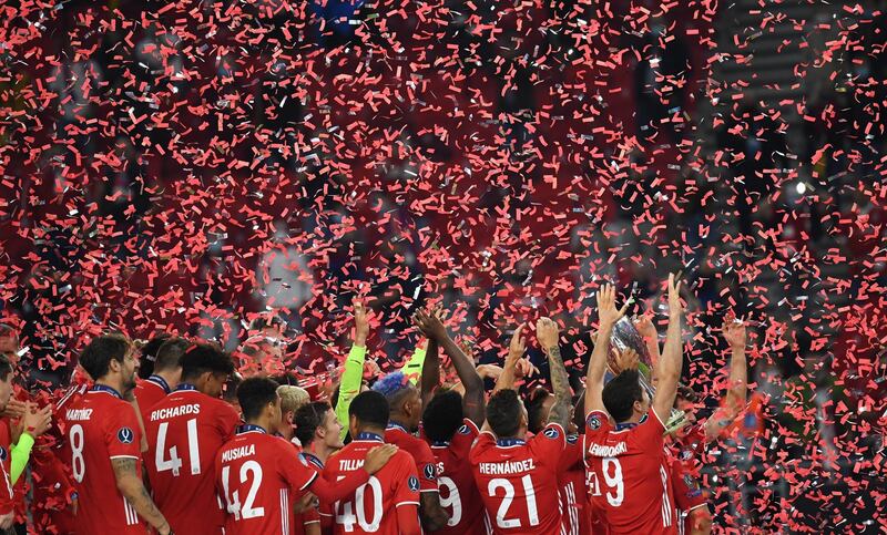 Bayern Munich players after winning the Uefa Super Cup final against Sevilla that completed a quadruple under manager Hansi Flick. EPA