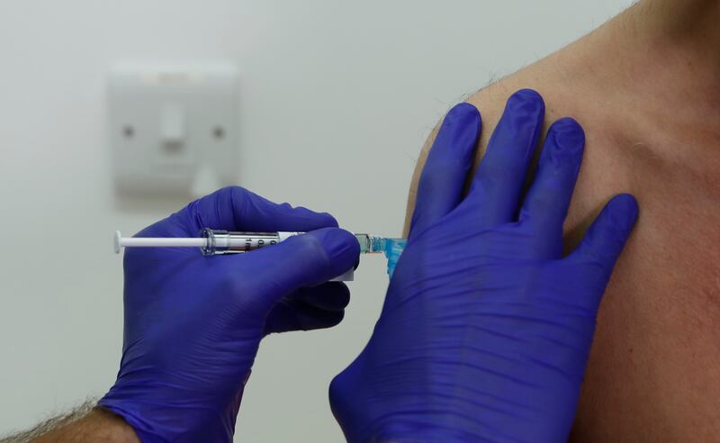 Phase 3 Novavax coronavirus vaccine trial volunteer Franklyn Howe is this month given an injection at St George's University hospital in London. Photo: AP