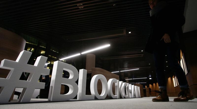 Giant letters, reading the word "blockchain", are displayed at the blockchain centre, which aims at boosting start-ups, on February 7, 2018 in Lithuania's capital Vilnius.
Britain's divorce with the European Union is paying off for Lithuania as it strives to become a northern European hub for financial technology, or "fintech" firms, and blockchain-based start-ups. European Parliament member and entrepreneur Antanas Guoga launched the blockchain centre in Vilnius to boost start-ups and establish connections with Asia and Australia. / AFP PHOTO / Petras Malukas