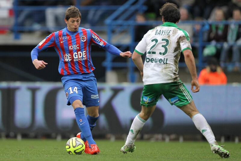 Caen's Argentinian forward  Emiliano Sala (L) vies for the ball with Saint-Etienne's French defender Paul Baysse during the French L1 football match between Caen (SMC) and Saint-Etienne (ASSE) on February 1, 2015 at the Michel d'Ornano stadium in Caen, northwestern France. AFP PHOTO / CHARLY TRIBALLEAU (Photo by CHARLY TRIBALLEAU / AFP)
