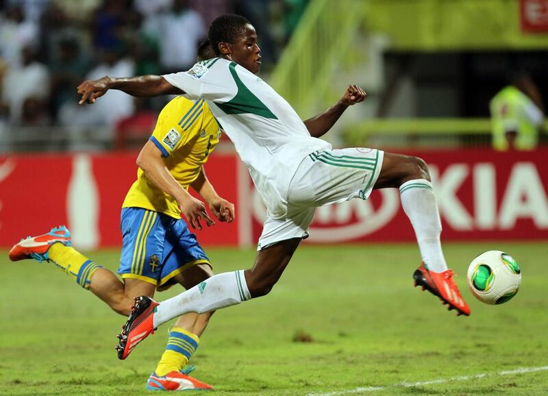 Chidera Ezeh scored the final goal of Nigeria's 3-0 defeat of Sweden in the Fifa Under 17 World Cup semi-finals. Despite the crowds of scouts watching the tournament, players for Nigeria and Mexico said they were more focused on winning the World Cup than securing a contract. AP Photo