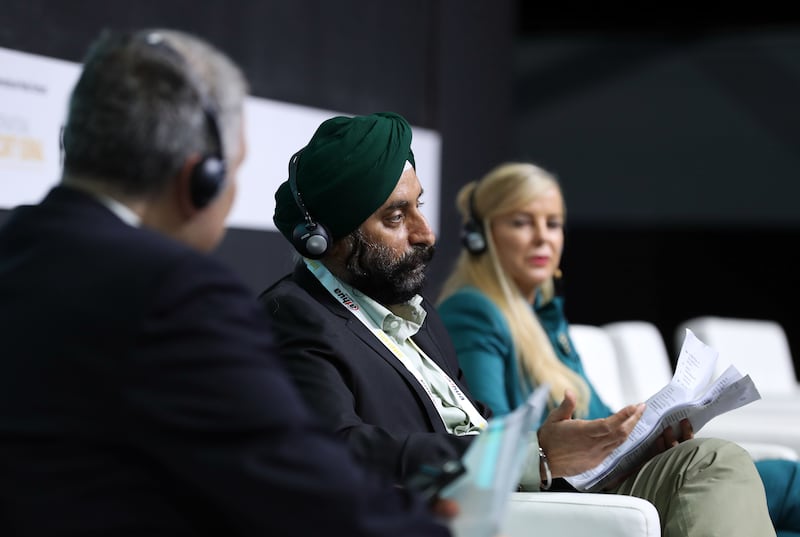Charanjeet Singh and Kate Barker during a panel discussion at the Intersec 2022 conference in Dubai. Chris Whiteoak / The National