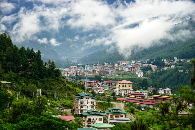 Bhutan's mountainous terrain makes development a challenge, but also provides abundant hydroelectric power. Unsplash