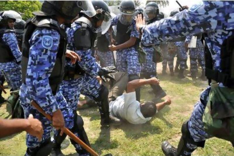 Riot police confronted protesters during an opposition-led demonstration held in Malé in May to protest against soaring prices and demand that President Mohamed Nasheed resign.