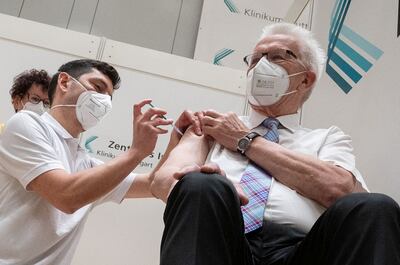 Winfried Kretschmann, Baden-Wuerttemberg federal Prime Minister of The Greens party receives his first AstraZeneca COVID-19 vaccination shot amid coronavirus pandemic in Stuttgart, Germany, March 19, 2021.   Marijan Murat/Pool via REUTERS