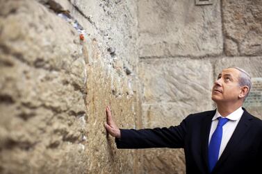 Benjamin Netanyahu touches the Western Wall in Jerusalem's Old City. Reuters