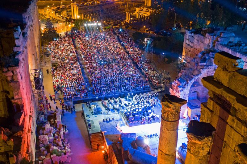 Fans attend a concert of Palestinian singer Mohammed Assaf as he performs on stage during the annual Baalbeck International Festival (BIF) in Baalbeck, Beqaa Valley, Lebanon, 20 July 2019. The festival runs from 05 July to 03 August 2019. Photo: EPA