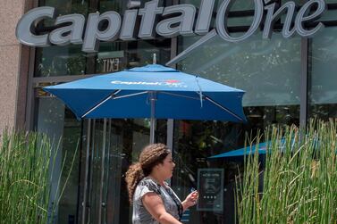People walk past a Capital One Bank branch in Los Angeles, California. A hacker accessed more than 100 million credit card applications with US financial heavyweight Capital One, the firm said on July 29, 2019, in one of the biggest data thefts to hit a financial services company. AFP