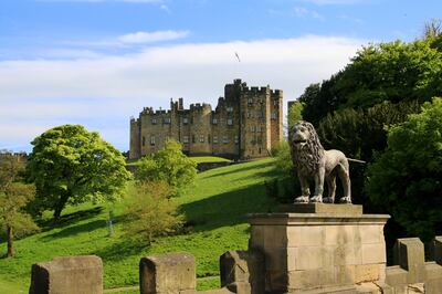 Alnwick Castle viewed from Lion Bridge. Alnwick Castle is a majestic medieval fortress dating from the 11th century and dominates the surrounding Northumberland landscape. Getty Images